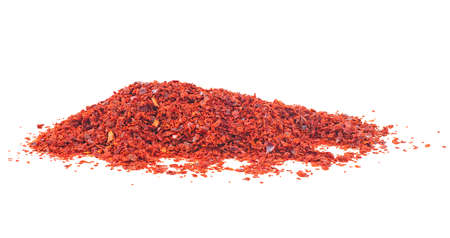 Pile of red pepper flakes isolated on a white background. Crushed red pepper.の写真素材