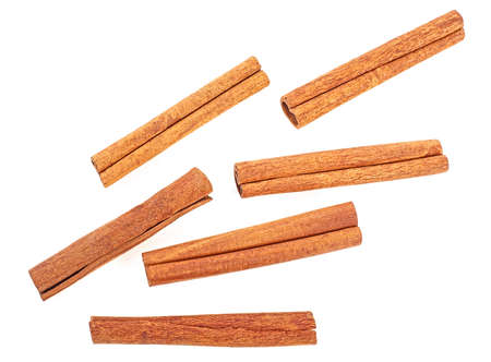 Cinnamon sticks isolated on a white background, top view. Fragrant cinnamon sticks. Cinnamon bark.の写真素材