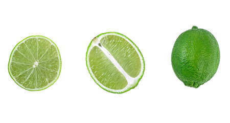 Set of lime fruits isolated on white background, whole and slices. Top view.の写真素材