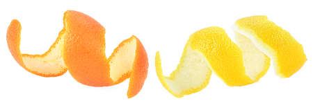 Fresh peel of lemon and orange fruit isolated on a white background. Citrus zest spiral.の写真素材