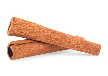 Two aromatic cinnamon sticks isolated on a white backgroundの写真素材