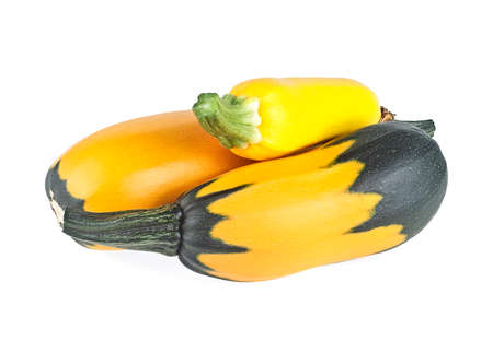 Mixed yellow and green zucchini isolated on a white backgroundの写真素材