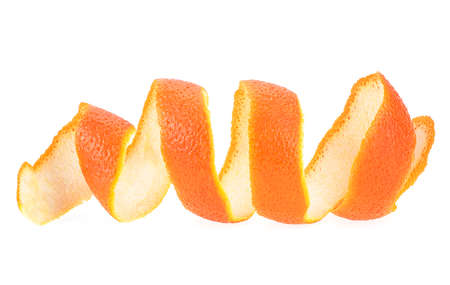 Curly orange peel strip isolated on a white background. Orange twist. Skin of orange. Citrus fruit.の写真素材