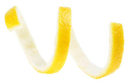Fresh lemon peel isolated on a white background, healthy food. Skin of fresh lemon in spiral form. Citrus twist peel.の写真素材