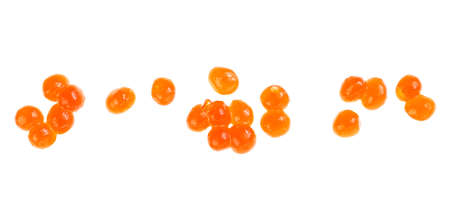 Red caviar isolated on a white background, top view. Delicious seafood. Salmon and trout caviar.の写真素材