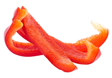 Red sweet bell pepper sliced strips isolated on a white background. Red fresh paprika.の写真素材