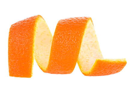 Orange zest isolated on a white background. Curly orange peel. Citron.の写真素材