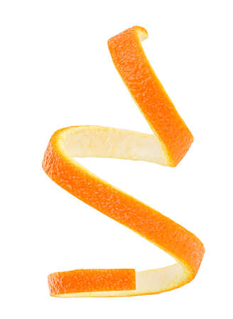 Vertical image of orange peel in spiral form on a white background. Isolated image. Skin of orange fruit.の写真素材