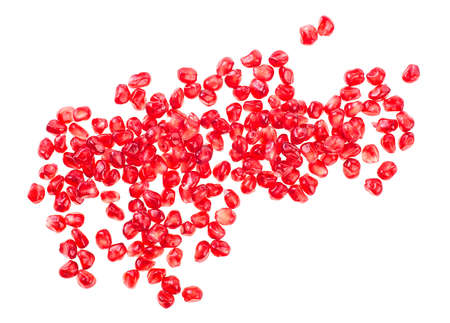 Pomegranate seeds isolated on a white background, top view.の写真素材