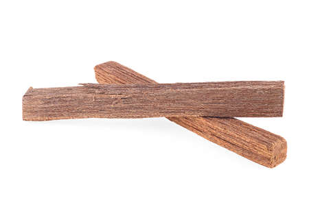 Close up of sandalwood isolated on a white background. Chandan. Two sandalwood sticks.の写真素材