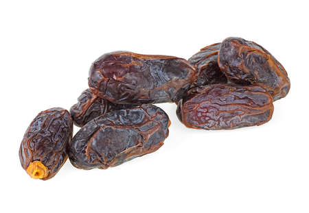 Dried sweet dates isolated on a white background. Dried fruits from date palm.の写真素材