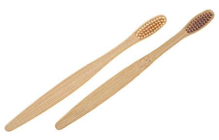 Wooden toothbrushes isolated on a white background. Bamboo toothbrush. Dental concept.の写真素材