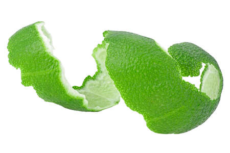 Lime fruit peel isolated on a white background. Skin of fresh lime. Lime twist. Image without shadow.の写真素材