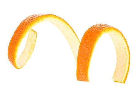 Single orange peel on a white background. Orange twist, close up. Orange zest spiral.の写真素材