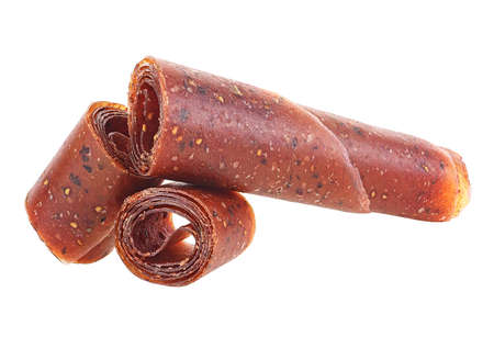 Fruit pastille isolated on a white background. Fruit roll-ups made from raspberry, apples, orange and currant.の写真素材