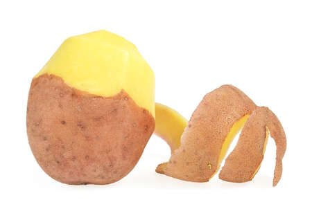 Potatoes with peel isolated on a white background. Peeled potatoes.の写真素材