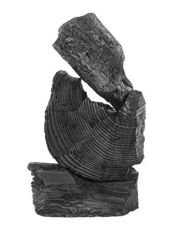 Traditional hardwood charcoal isolated on a white background. Natural wood charcoal.の写真素材