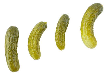 Set of pickled cucumbers of different shapes isolated on a white background, top view. Group of pickles. Cornichons.の写真素材