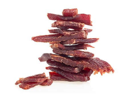 Beef jerky pieces isolated on a white background. Portion of beef jerky.の写真素材