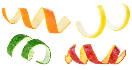 Twisted peel of Sicilian orange, lemon, orange and lime isolated on a white background. Set of images.の写真素材