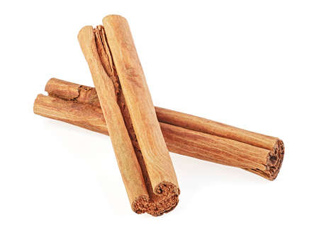 Two Ceylon cinnamon sticks isolated on a white background. Ceylon cinnamon true flavor aromatic spice.の写真素材