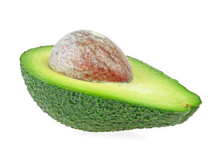 Green half avocado isolated on a white background. Tasty ripe avocados. Tropical fruit.の写真素材