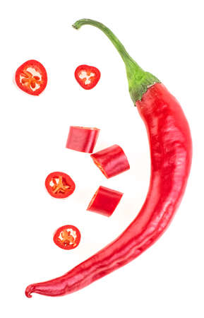 Red chilli pepper with sliced isolated on a white background, top view.の写真素材