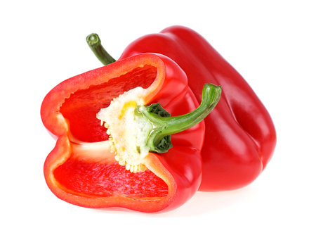 Fresh whole and half of red sweet pepper isolated on a white background. Bulgarian peppers.の写真素材