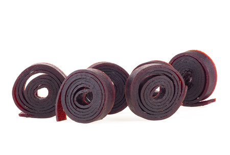 Natural and healthy snack food - fruit pastille from apples and currant on a white background. Fruit Marshmallow.の写真素材