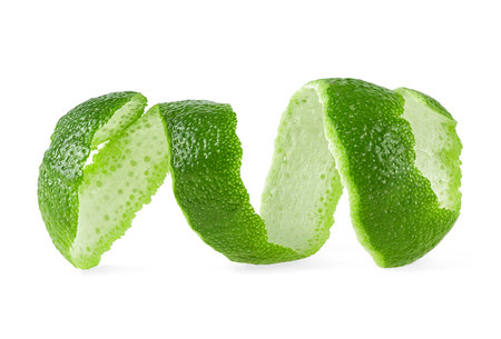 Peel of green lime isolated on a white background. Lime fruit peel. Lime skin.の写真素材