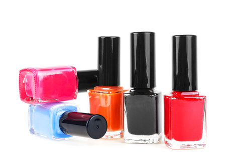 Nail polish bottles isolated on a white background. Colored bottles with nail polish.の写真素材