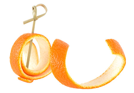Cocktail ingredient - Orange peel with bamboo skewer isolated on a white background.の写真素材
