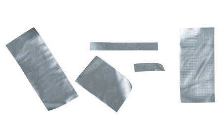 Metallic reinforced tape. Set pieces of silver self adhesive construction tape isolated on a white background.の写真素材