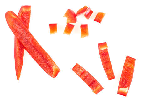Red sweet bell pepper slices isolated on a white background. Top view. Different shapes and sizes.の写真素材