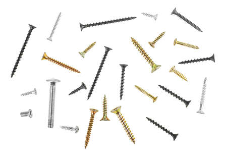 Different screws isolated on a white background, top view. Mixed screws.の写真素材