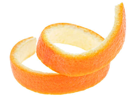 Orange twist isolated on a white background. Orange peel. Orange zest spiral.の写真素材