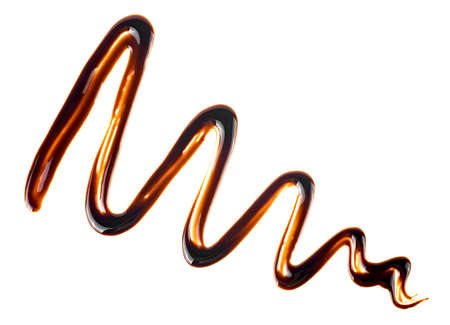 Liquid chocolate isolated on a white background. Melted chocolate.の写真素材