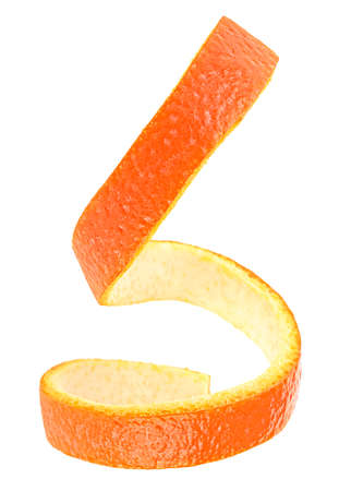 Cocktail ingredient - vertical image of spiral orange peel isolated on a white background. Citron.の写真素材