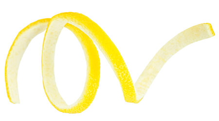 Lemon zest in spiral form as cocktail ingredient, white background. Lemon peel.の写真素材