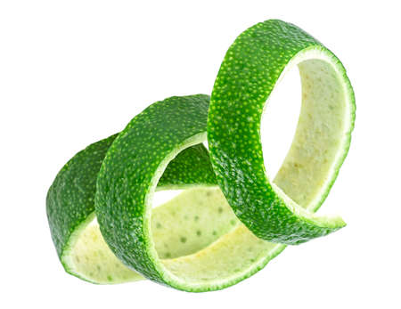Peel of fresh ripe lime on a white background. Curly lime twist.の写真素材