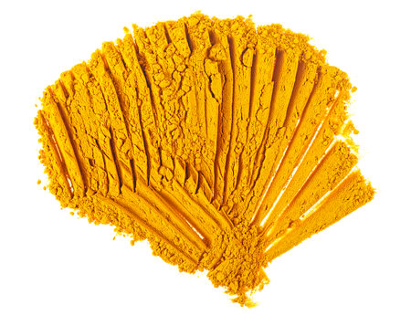 Turmeric powder isolated on a white background, top view. Curcuma.の写真素材