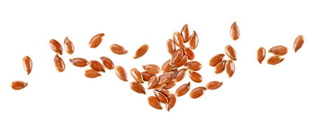 Top view of brown flaxseed isolated on a white background. Dried linseeds.の写真素材