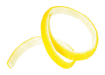 Lemon zest or lemon peel isolated on a white background. Citrus twist peel. Cocktail ingredient.の写真素材