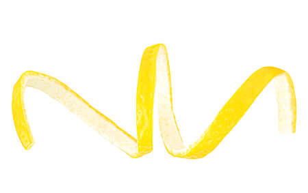 Peel of fresh lemon fruit isolated on a white background. Spiral of lemon zest.の写真素材