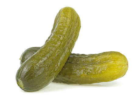 Two marinated pickled cucumbers isolated on a white background. Delicious pickled cucumbers.の写真素材