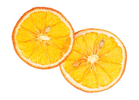 Dried slices of orange isolated on a white background, top view.の写真素材