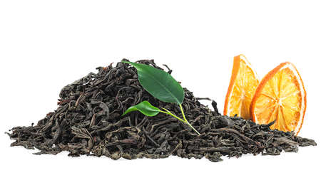 Fresh and dry tea leaves with dried orange slices isolated on a white backgroundの写真素材