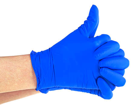 Medical or cleaning concept - human hands in blue rubber gloves isolated on a white background.の写真素材