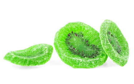 Slices of dried kiwi fruit isolated on a white background. Candied kiwi fruit.の写真素材