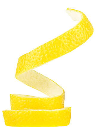 Vertical image of fresh lemon zest isolated on a white background. Lemon peel.の写真素材
